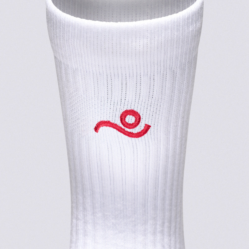 A white ribbed athletic sock with a red stylized logo on the side, shown against a light gray background.