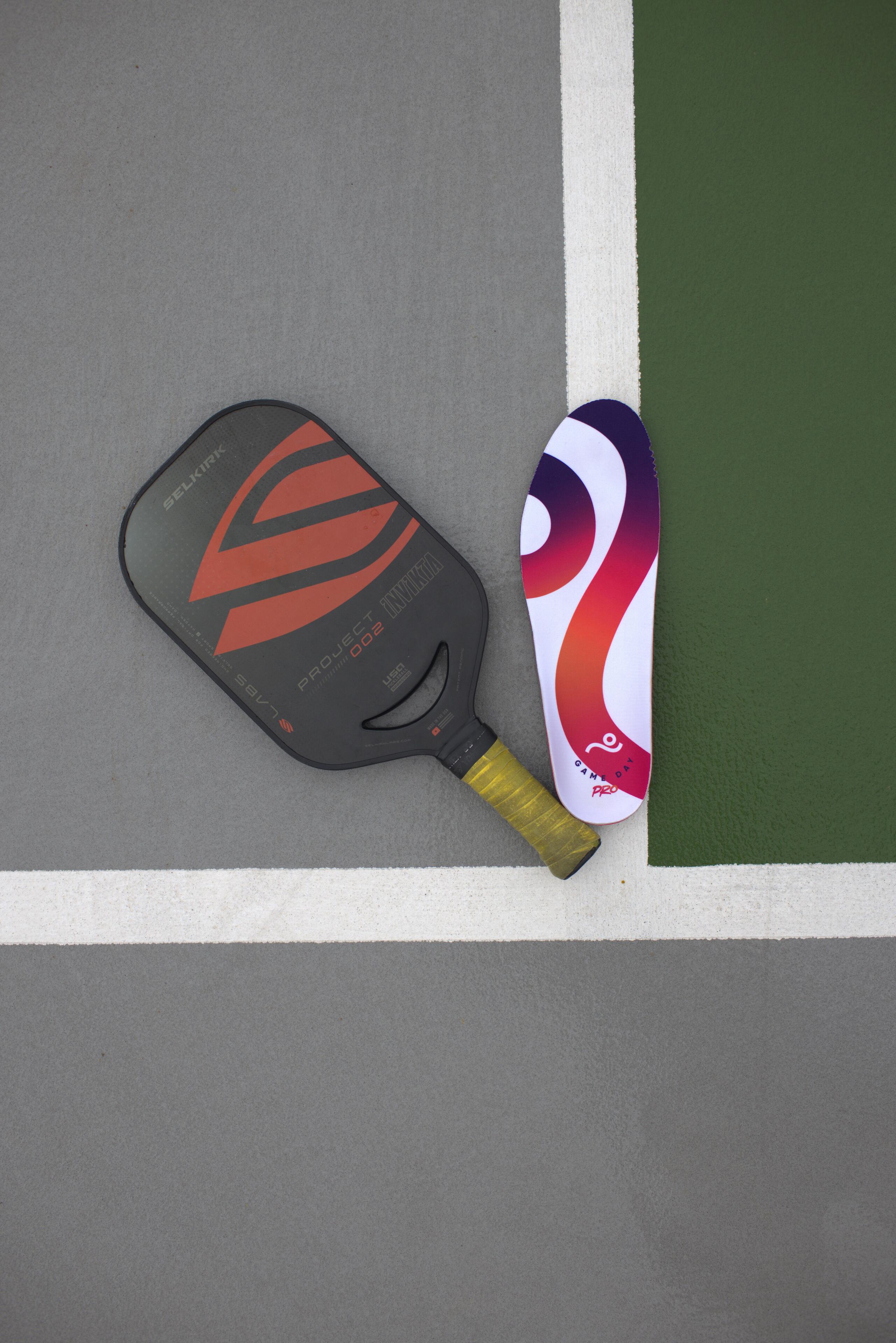 Game Day Pro insole with Selkirk paddle and pickleball flat lay