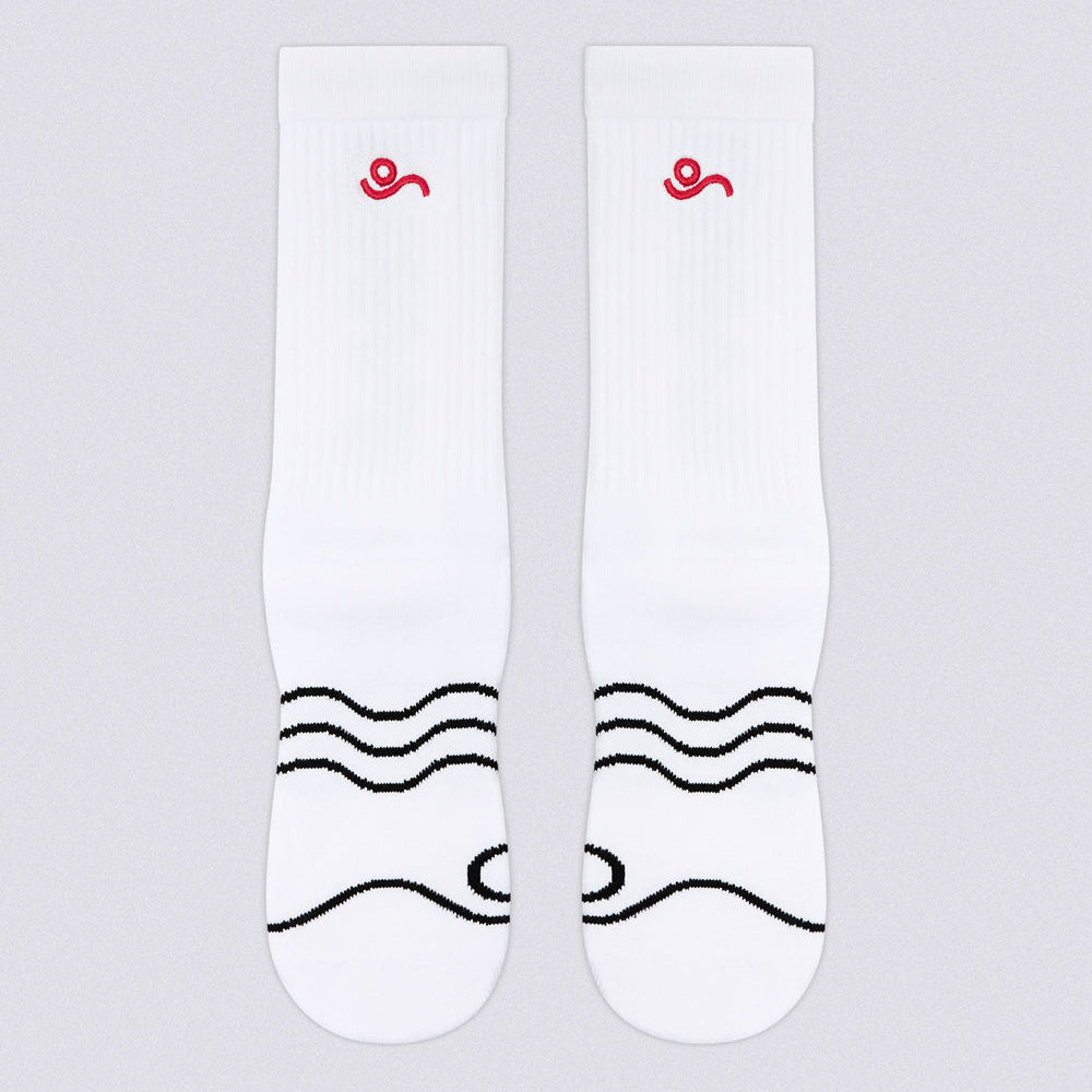 A pair of white crew socks with a small red spiral logo near the cuff and black wavy line graphics across the foot, shown on a light gray background.