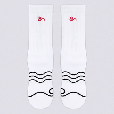 A pair of white crew socks with a small red spiral logo near the cuff and black wavy line graphics across the foot, shown on a light gray background.