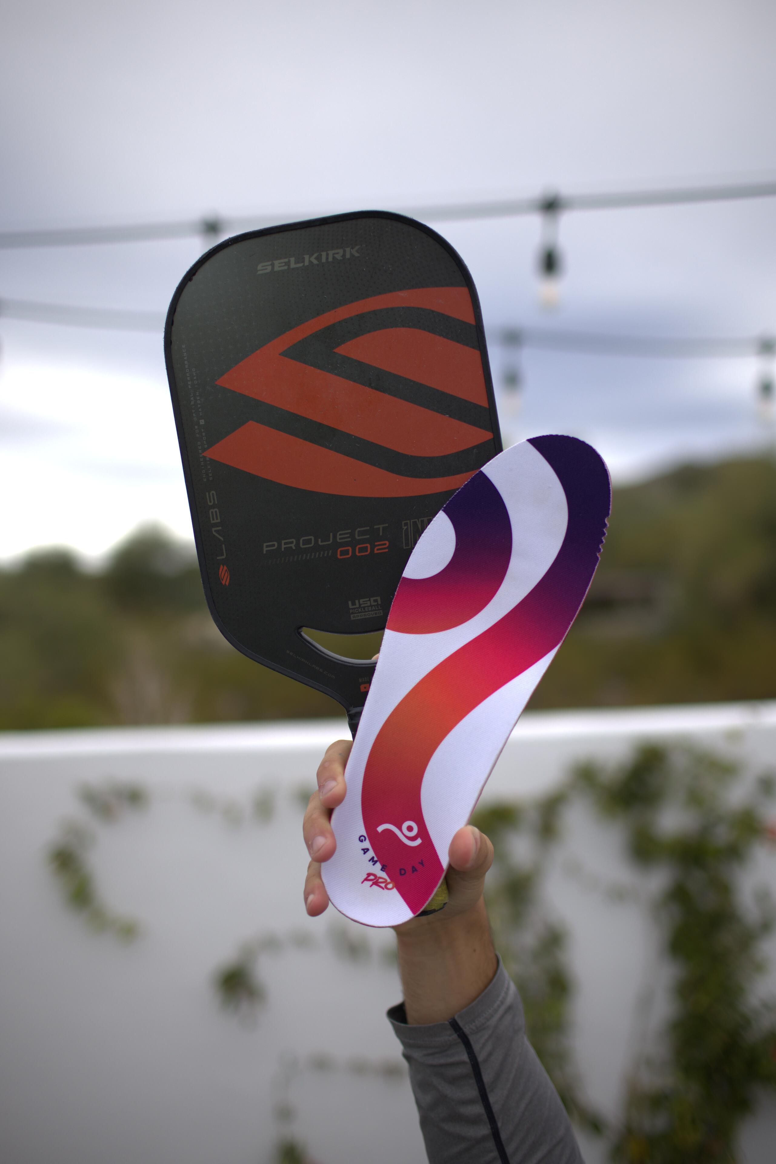 Close-up of Selkirk paddle showing GAME DAY PRO and ENGINEERED IN SPORT